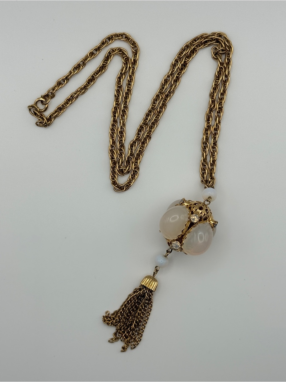 Gold-Tone Long Necklace with Opalescent Pendant and Tassel